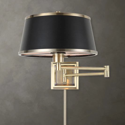 Newmarket 1-Light Sconce by Uttermost in brass. Made from steel, leather in a modern style.