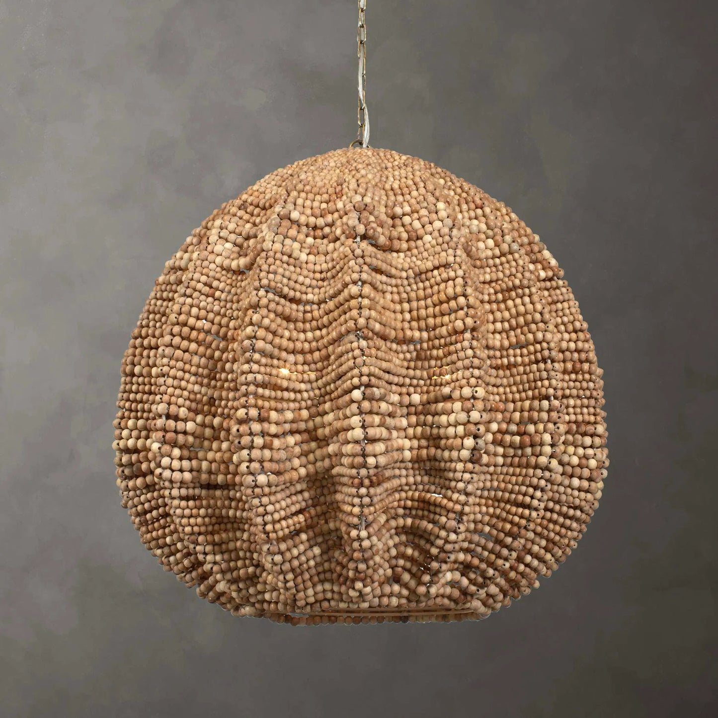 003 SI-2386637 | Lifestyle | Kauri 5 Light Bead Pendant by Uttermost in brass. Made from iron, wood beads in a rustic style.