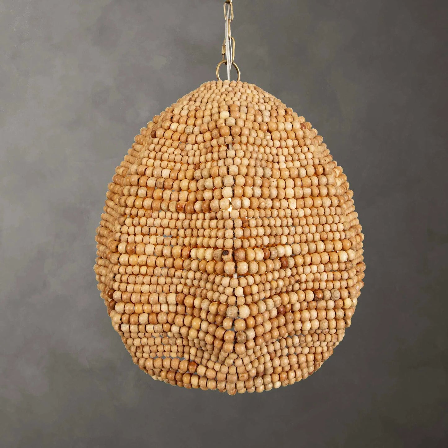 005 SI-2386638 | Lifestyle | Kauri 1 Light Bead Pendant by Uttermost in brass. Made from iron, wood beads in a rustic style.