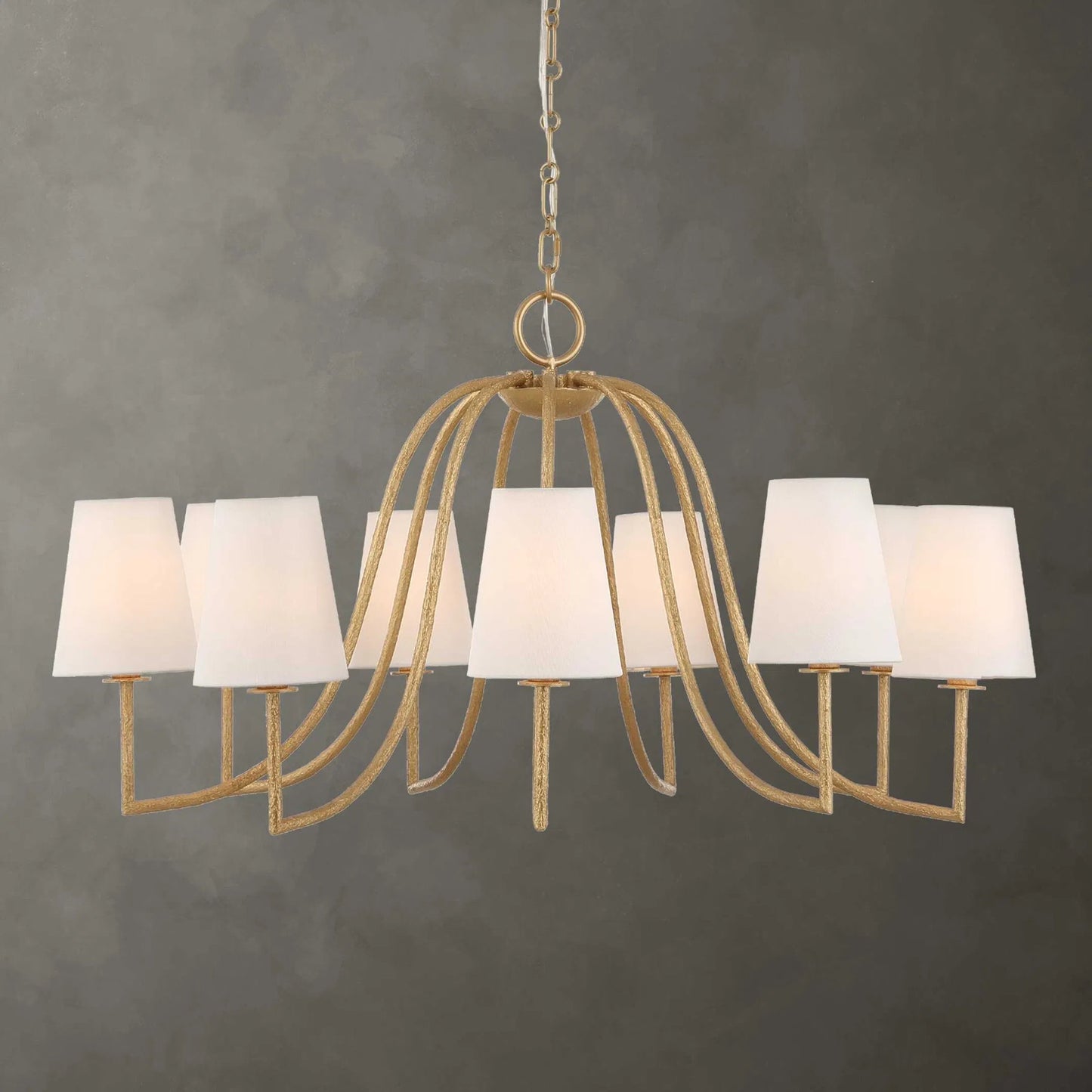 005 SI-2453069 | Lifestyle | Seville 9 Light Chandelier by Uttermost in gold. Made from iron, fabric in a traditional style.