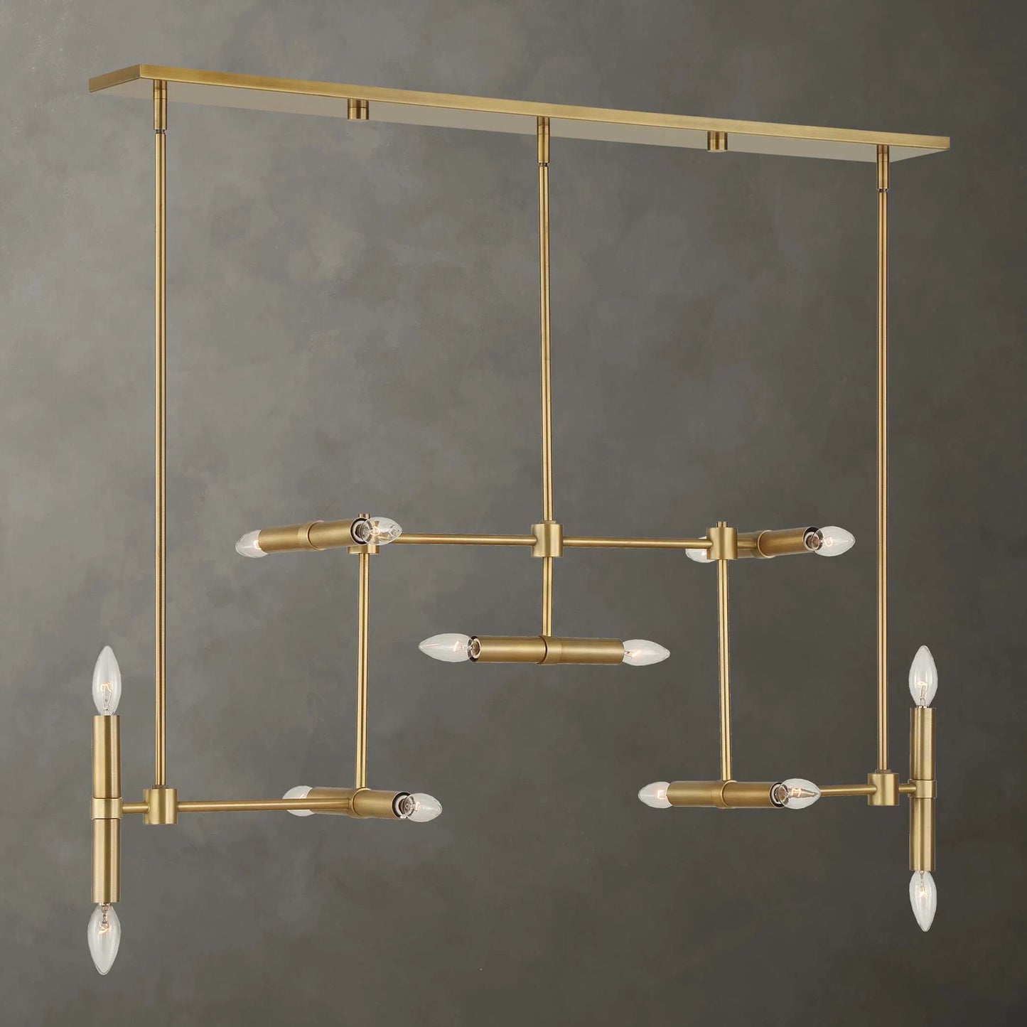 004 SI-2453091 | Lifestyle | Cadre 14 Light Modern Linear Pendant by Uttermost in brass. Made from iron in a transitional style.