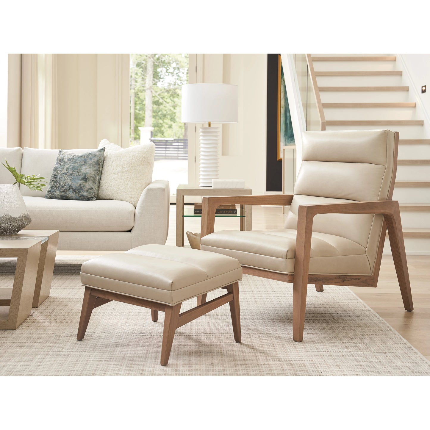 003 SI-2136925 | Lifestyle | Hayley Leather Ottoman by Tommy Bahama Home in leather. Made from unique in a modern style.