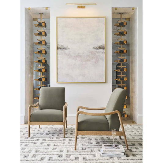 Gianna Leather Chair by Barclay Butera in green and tan. Made from mahogany, leather in a unique style.