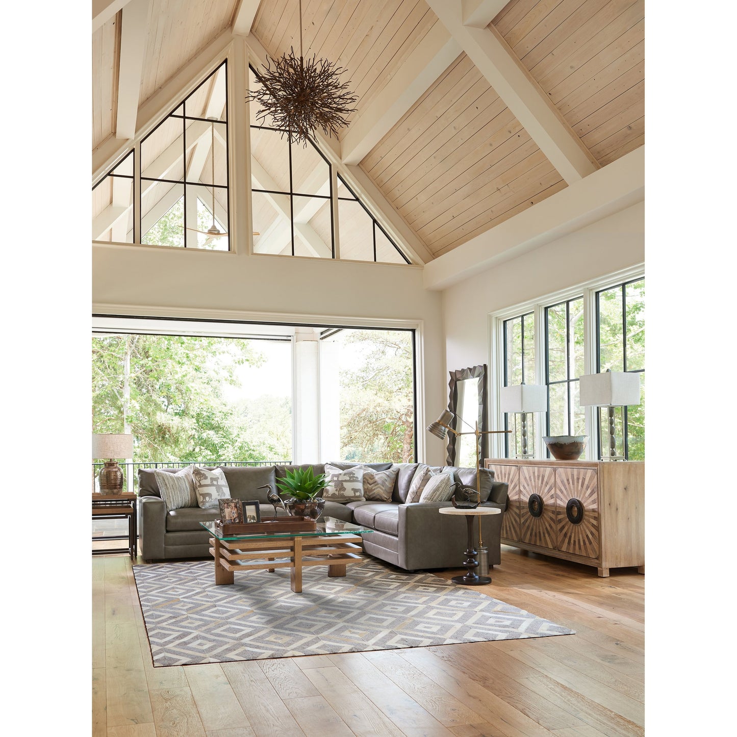 006 SR-836259 | Lifestyle | Marshall Stone Top Round End Table by Tommy Bahama Home. Made from unique in a transitional style.