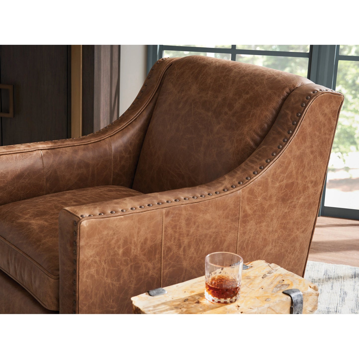 005 SI-2136966 | Closeup | Barrier Leather Swivel Chair by Lexington. Made from unique in a transitional style.