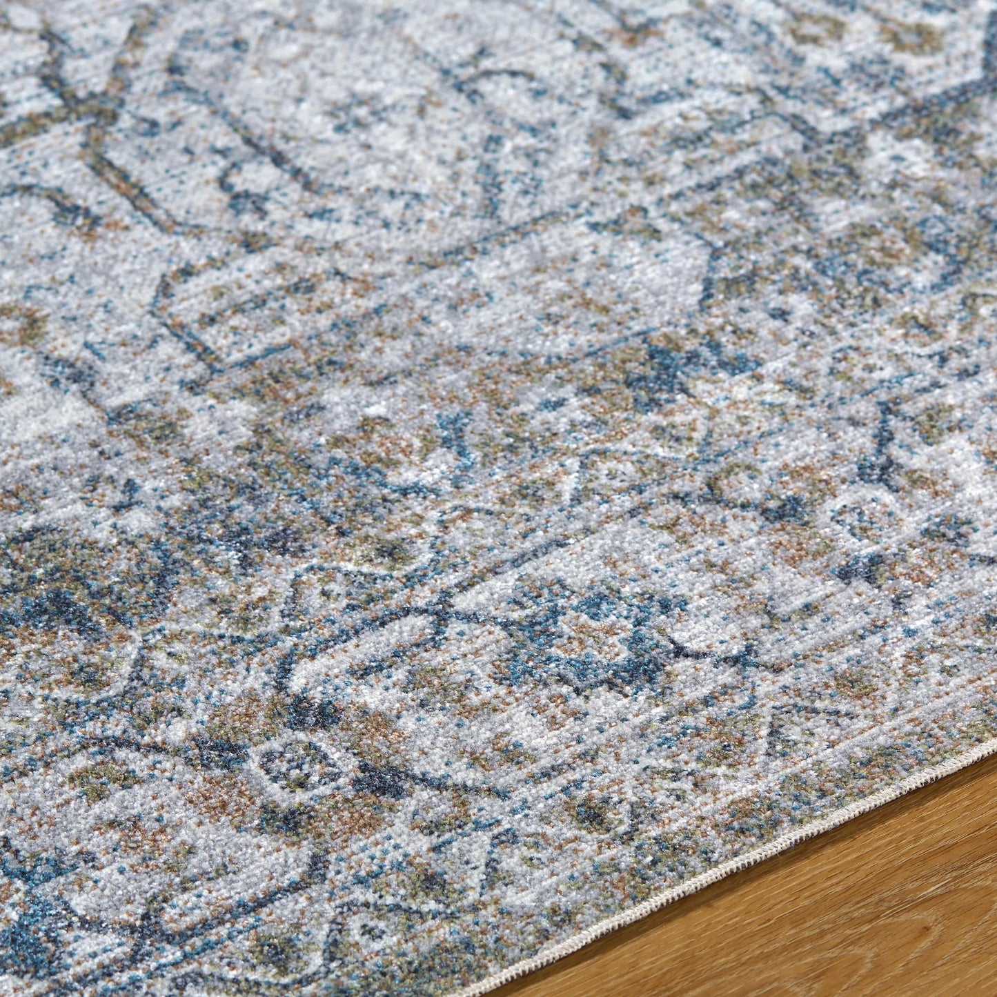 006 SI-2168172,SI-2168173,SI-2168174,SI-2168175,SI-2168176,SI-2168178,SI-2168179 | Closeup | Lillian Rug - 532408 by Livabliss in charcoal, ivory, brown, dark blue, olive, dark green. Made from polyester in a unique style.