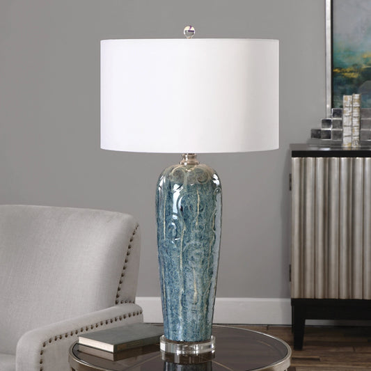 Maira Table Lamp by Uttermost in blue. Made from crystal, steel, ceramic in a modern style.