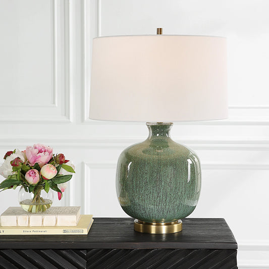 Nataly Table Lamp by Uttermost in aged green. Made from steel, glass in a modern style.