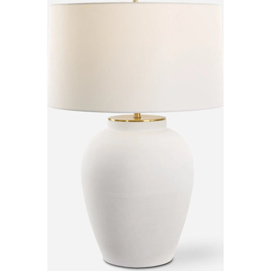Adelaide Table Lamp by Uttermost in brass. Made from porcelain, fabric, steel in a modern style.