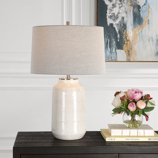 Odawa Table Lamp by Uttermost in off-white. Made from steel, ceramic, fabric in a modern style.