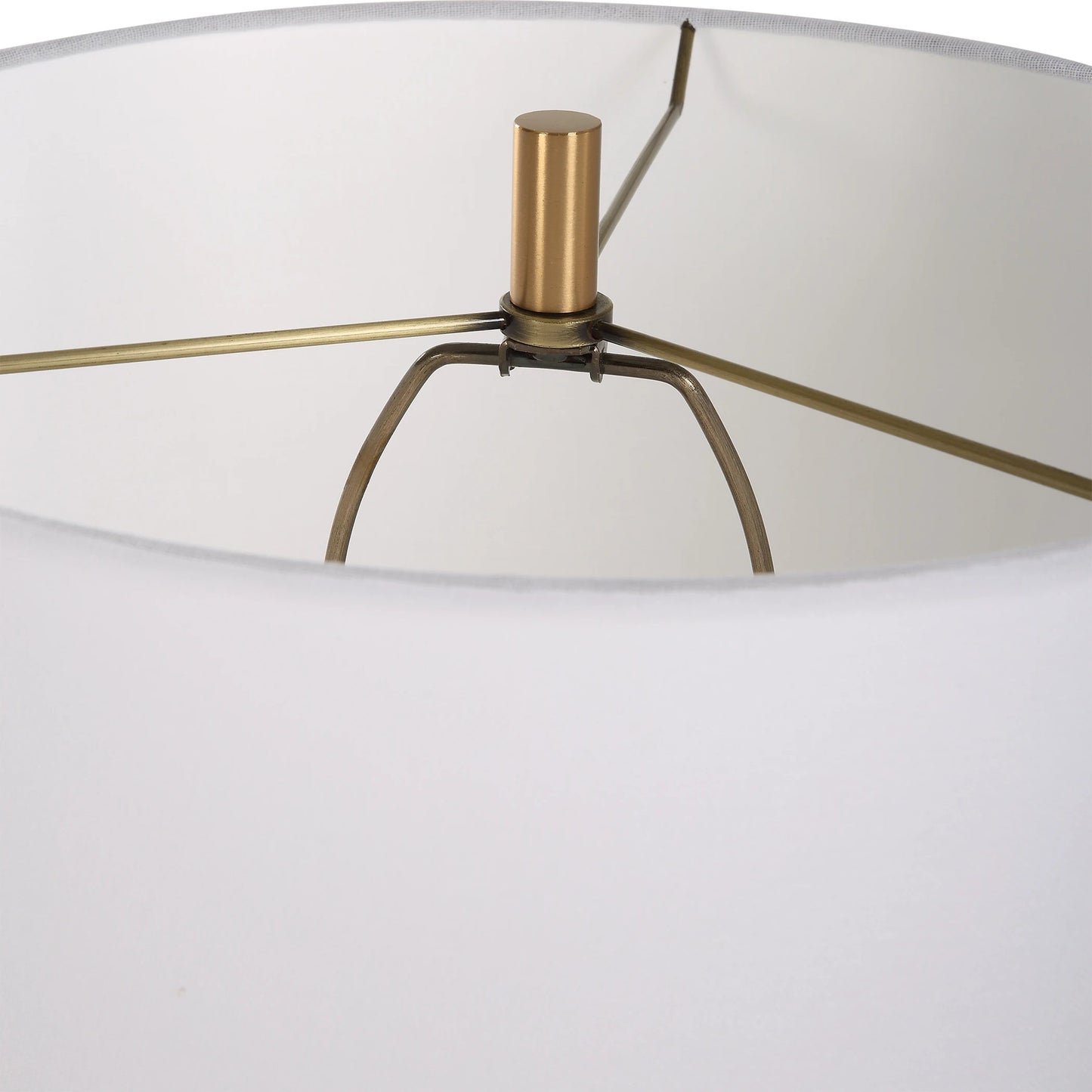 004 SI-2146875 | Closeup | Palu Travertine Table Lamp by Uttermost in brass. Made from iron, travertine, linen in a modern style.