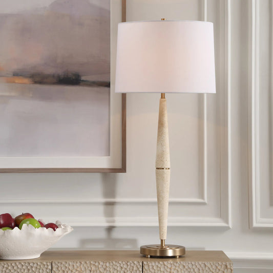 Palu Travertine Table Lamp by Uttermost in brass. Made from iron, travertine, linen in a modern style.