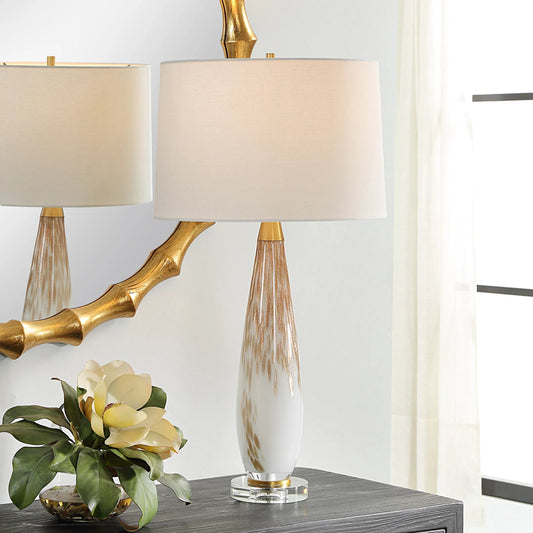 Lyra & Table Lamp by Uttermost in gold. Made from crystal, glass, iron, fabric in a transitional style.