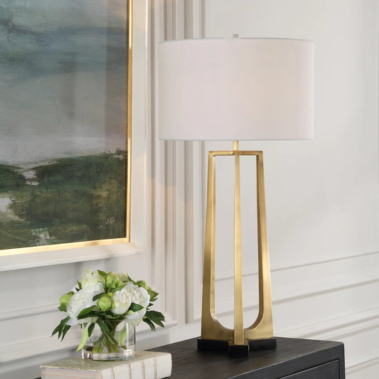 Crossroads Table Lamp by Uttermost in brass. Made from iron, marble, fabric in a transitional style.