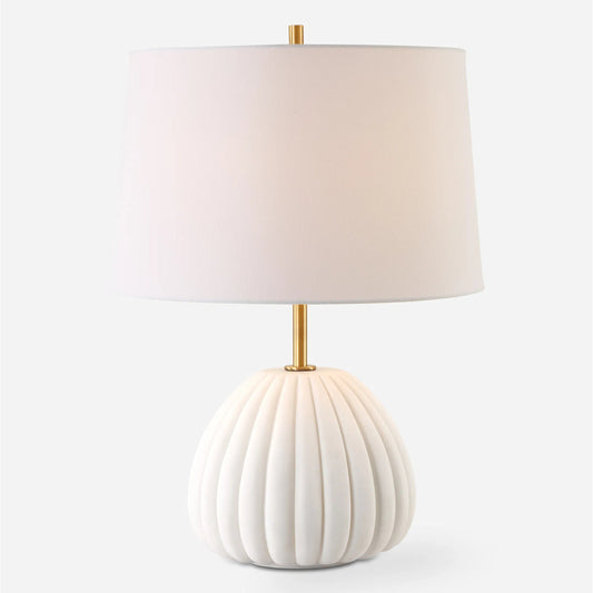 Lynna Table Lamp by Uttermost in brass. Made from rice stone, iron, fabric in a transitional style.