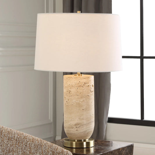 Aubrey Travertine Table Lamp by Uttermost in brass. Made from metal, marble, fabric in a transitional style.