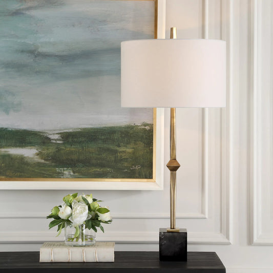 Suranne Antique Table Lamp by Uttermost in brass. Made from metal, marble, fabric in a modern style.