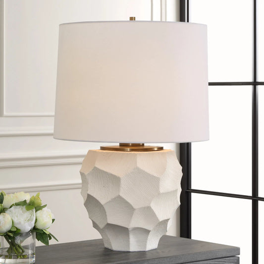 On Edge Chalk Table Lamp by Uttermost in brass. Made from metal, ceramic, linen in a modern style.