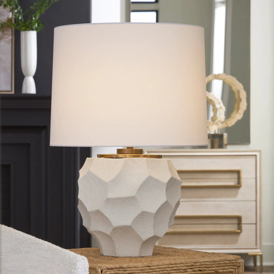 On Edge Chalk Table Lamp by Uttermost in brass. Made from metal, ceramic, linen in a modern style.