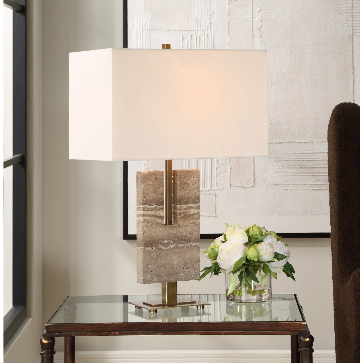 001 SI-2262435 | Lifestyle | Turning Point Travertine Table Lamp by Uttermost in brass. Made from iron, travertine, fabric in a transitional style.