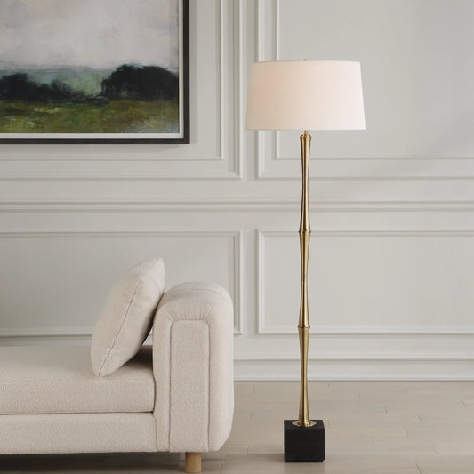 Shino Antique Floor Lamp by Uttermost in brass. Made from iron, travertine, fabric in a modern style.