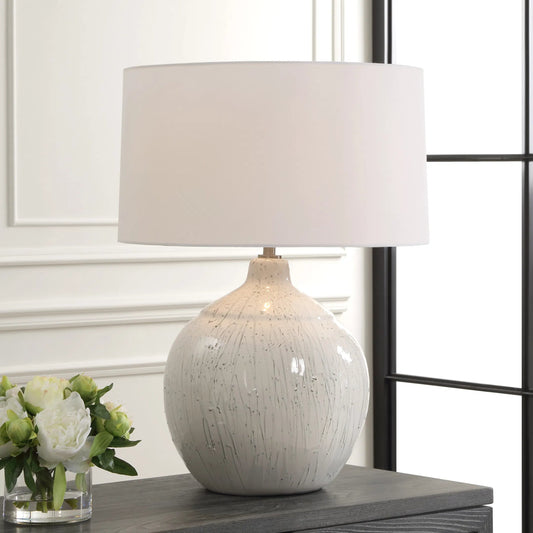 Dribble Glaze Table Lamp by Uttermost in nickel. Made from steel, ceramic, fabric in a transitional style.