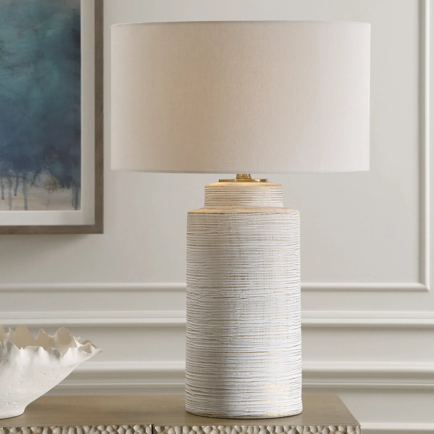 001 SI-2262452 | Lifestyle | Crimp Ribbed Table Lamp by Uttermost in gold leaf. Made from steel, ceramic, fabric in a transitional style.