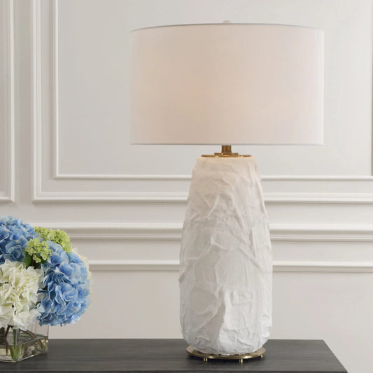 Vida Table Lamp by Uttermost in brass. Made from steel, ceramic, fabric in a modern style.