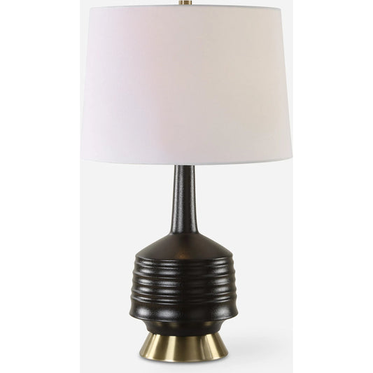 Foster Glaze Table Lamp by Uttermost in brass. Made from ceramic, metal, fabric in a modern style.
