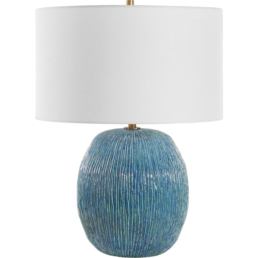 Elysia Textured Table Lamp by Uttermost in brass. Made from ceramic, iron, fabric in a eclectic & global style.