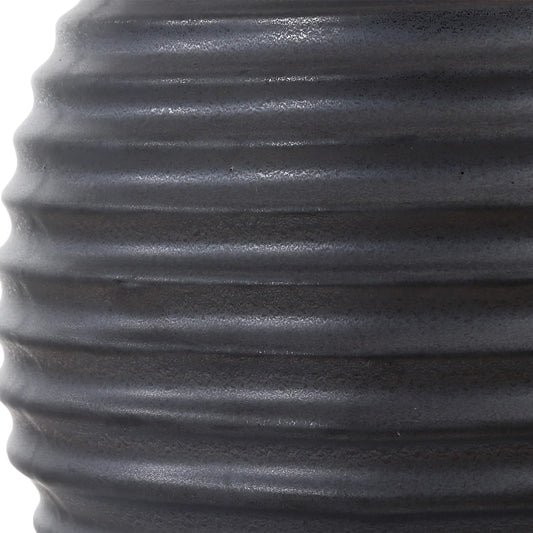 Chelsom Ribbed Table Lamp by Uttermost in dark bronze. Made from metal, ceramic, fabric in a modern style.