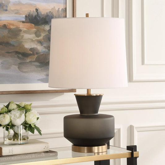 Trentino Table Lamp by Uttermost. Made from metal, glass, linen in a modern style.
