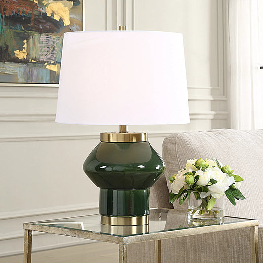 Tayson Jade Table Lamp by Uttermost in brass. Made from ceramic, metal, fabric in a eclectic & global style.