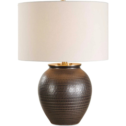 Hawkins Ribbed Table Lamp by Uttermost in dark bronze. Made from steel, ceramic, fabric in a rustic style.