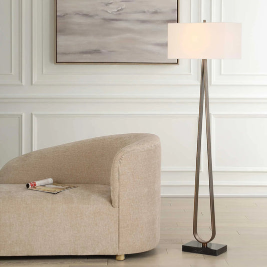 Galloway Minimalist Floor Lamp by Uttermost in dark bronze. Made from marble, iron, fabric in a modern style.