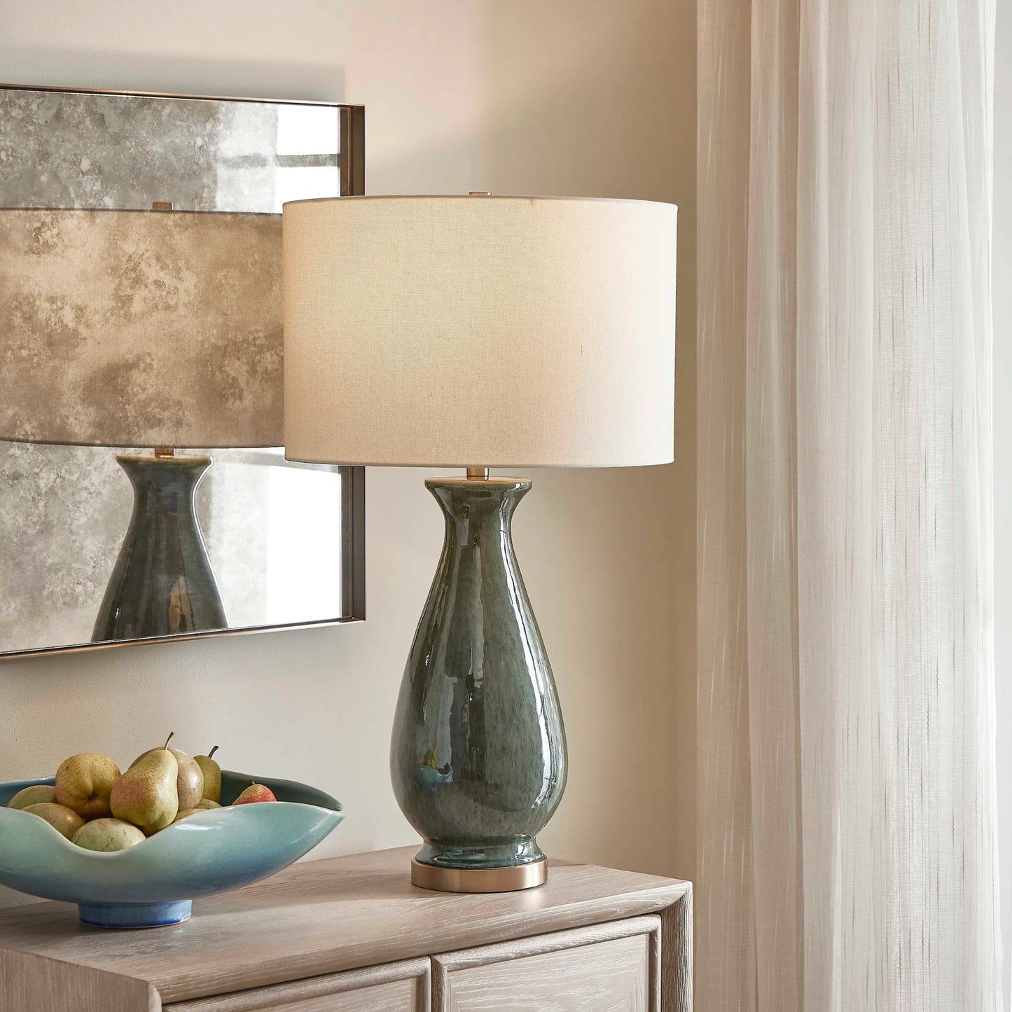 003 SI-2453115 | Lifestyle | Colestin Table Lamp by Uttermost in green and brass. Made from ceramic, iron, fabric in a eclectic & global style.