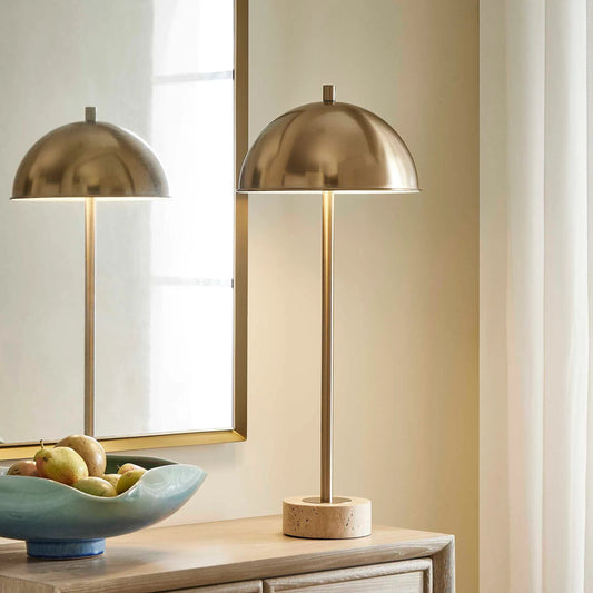 Dunham Buffet Lamp by Uttermost in brass. Made from iron, travertine in a transitional style.