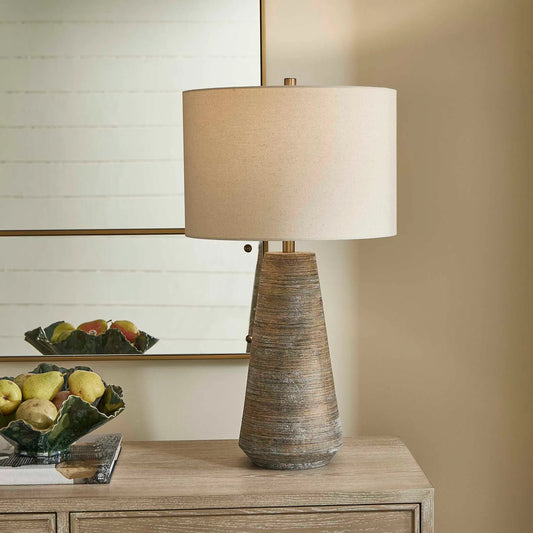 Mosier Table Lamp by Uttermost in brown, gray and brass. Made from ceramic, iron, fabric in a transitional style.