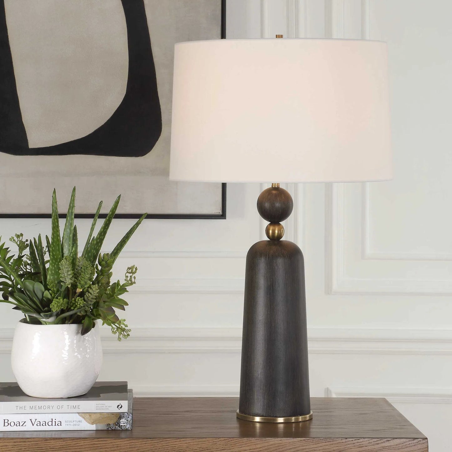 002 SI-2386712 | Lifestyle | McQuinn Table Lamp by Uttermost in dark walnut. Made from metal, wood, %fabric in a traditional style.