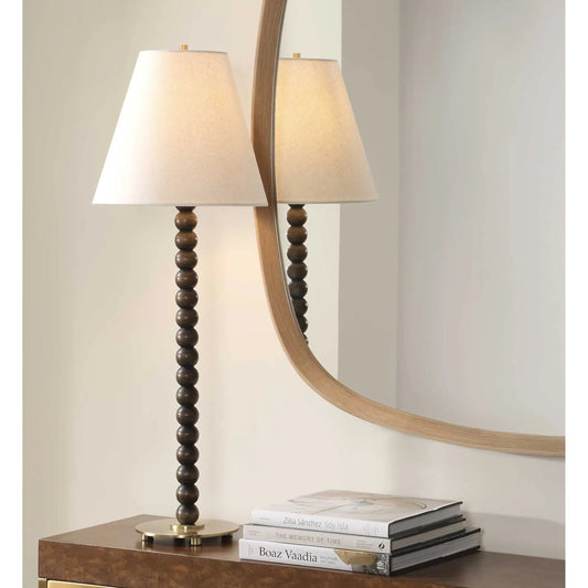 Gallus Spheres Table Lamp by Uttermost in dark walnut. Made from metal, rubber wood, fabric in a traditional style.