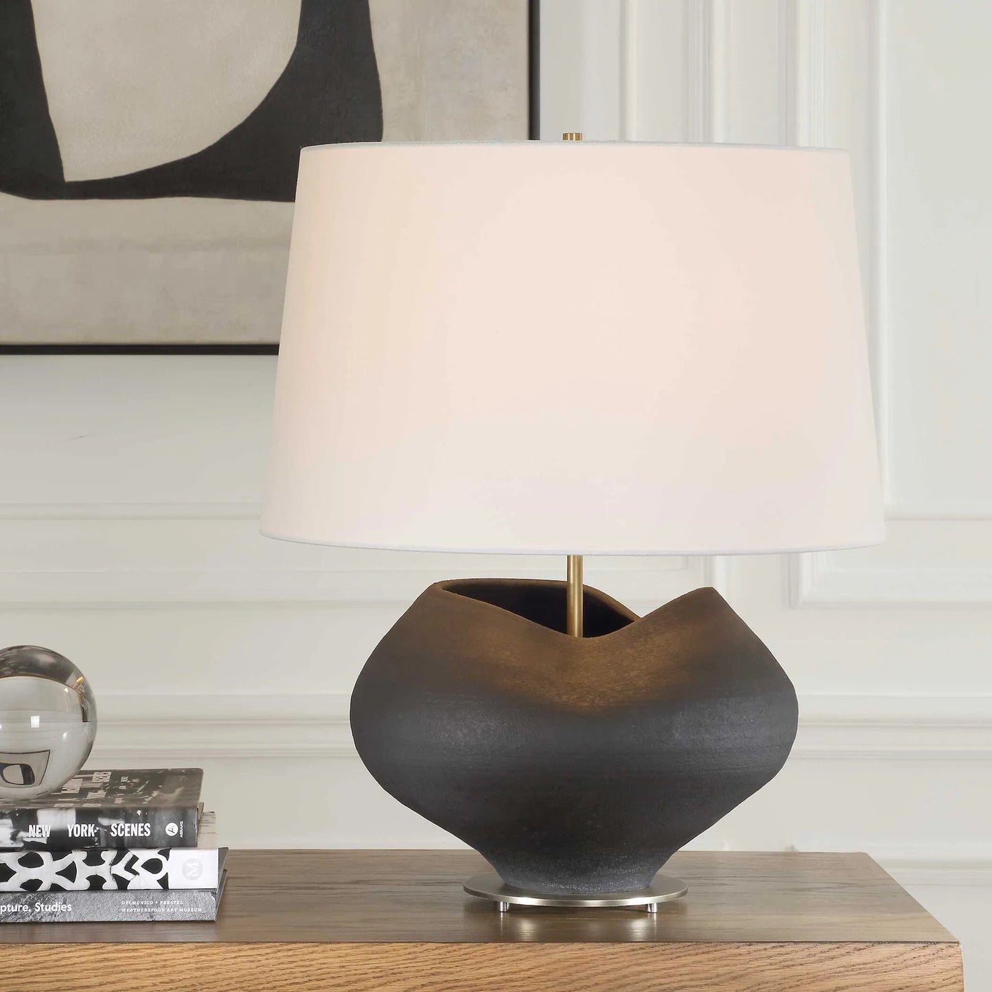 003 SI-2453117 | Lifestyle | Nocturne Table Lamp by Uttermost in black and brass. Made from porcelain, fabric, steel in a modern style.