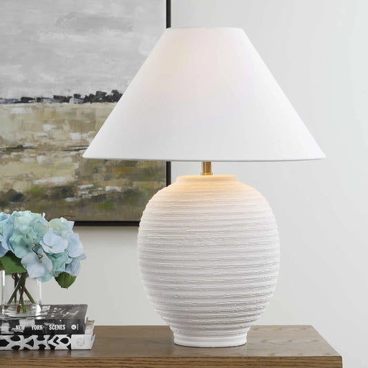 Rocio Ceramic Table Lamp by Uttermost in white and brass. Made from metal, ceramic, linen fabric in a transitional style.