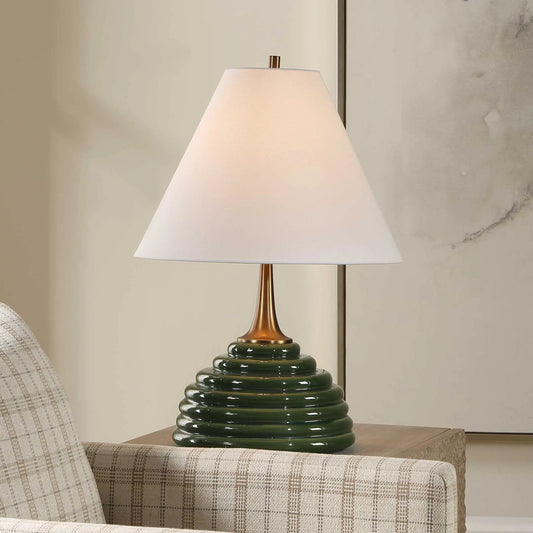 McKay Table Lamp by Uttermost in green and dark. Made from ceramic, iron, fabric in a unique style.