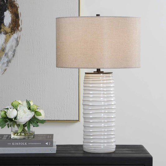 Barat Ceramic Table Lamp by Uttermost in white. Made from iron, ceramic, fabric in a unique style.