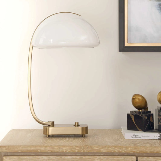 Bend the Rules Desk Lamp by Uttermost in brass. Made from metal, glass in a unique style.