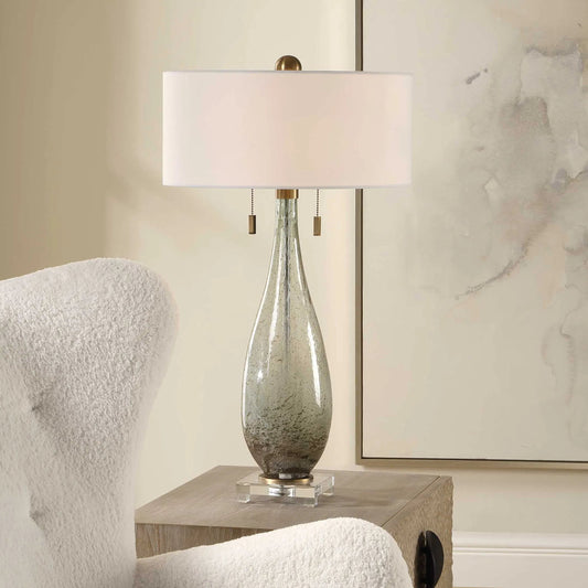 Cardoni Table Lamp by Uttermost in green. Made from metal, glass, linen, crystal in a unique style.