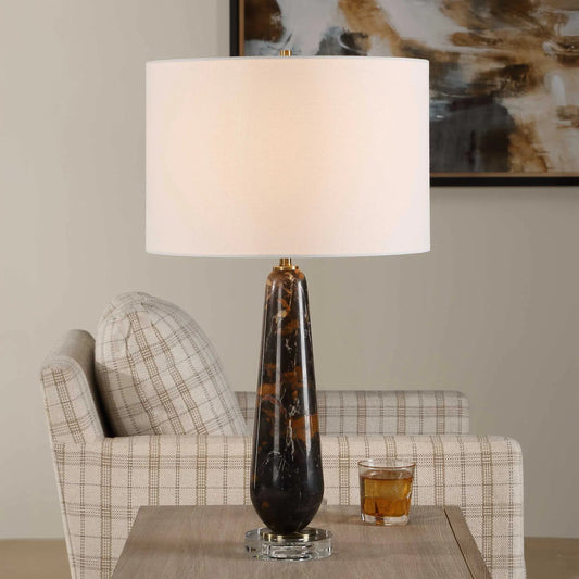 Dames Table Lamp by Uttermost in black, brown and dark. Made from iron, crystal, marble in a unique style.