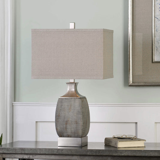 Caffaro Table Lamp by Uttermost in bronze. Made from ceramic, steel, linen in a modern style.