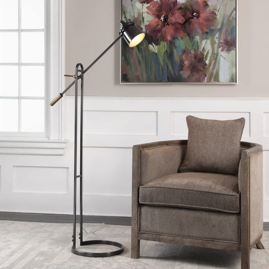 Chisum Floor Lamp by Uttermost in bronze. Made from steel in a modern style.