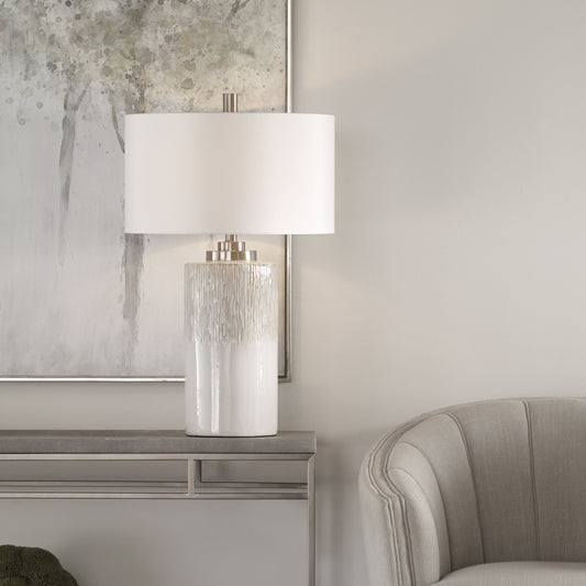 Georgios Table Lamp by Uttermost in aged white. Made from iron, ceramic, linen in a coastal style.